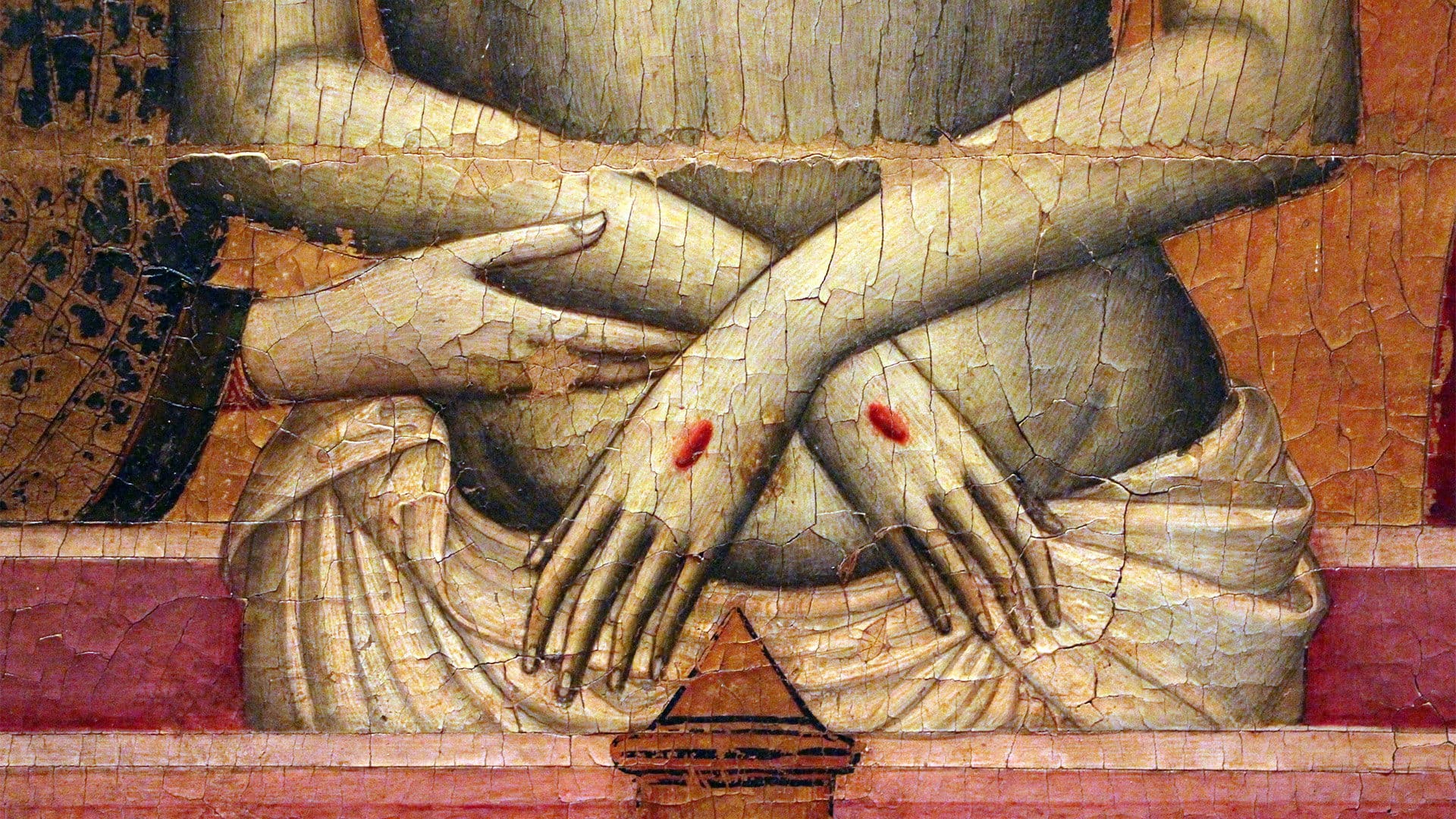 Close-up of a painting showing a bare torso with crossed hands resting on the abdomen, each hand marked with a red wound. The figure is draped with a white cloth, and the painting has visible cracks from age.