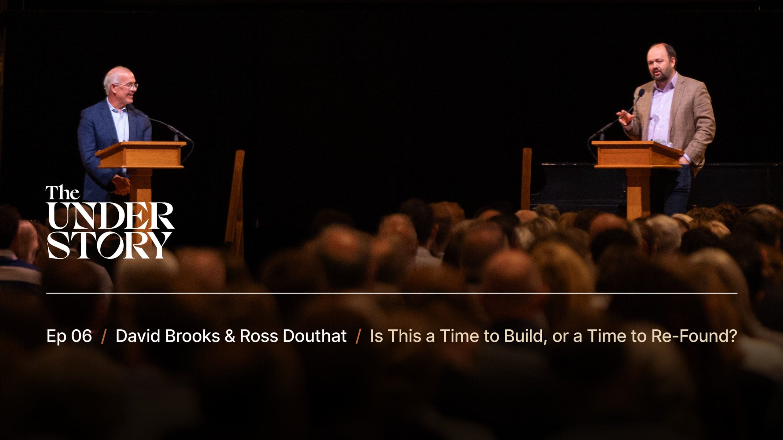 Two men stand at podiums on a stage, addressing a seated audience. Text on the image reads: The Understory Ep 06 / David Brooks & Ross Douthat / Is This a Time to Build, or a Time to Re-Found?.